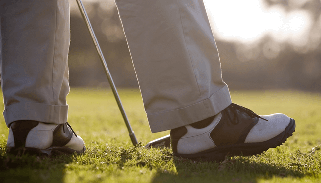 A golfer on the green.