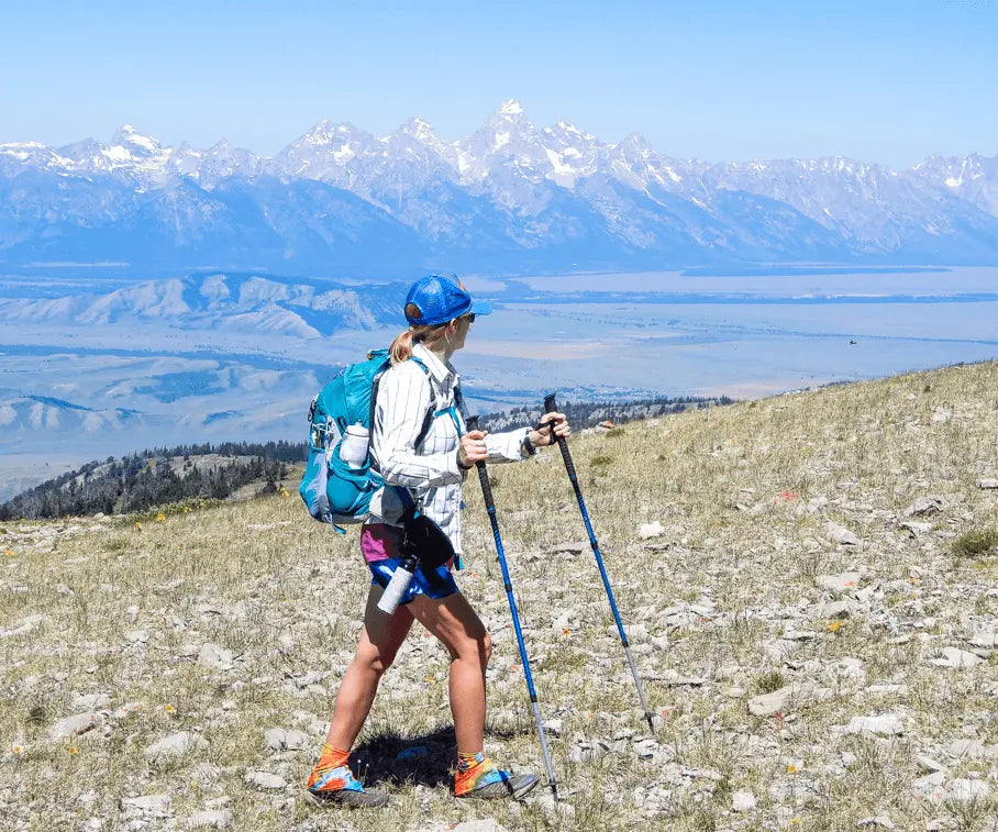 A woman breaking in hiking boots