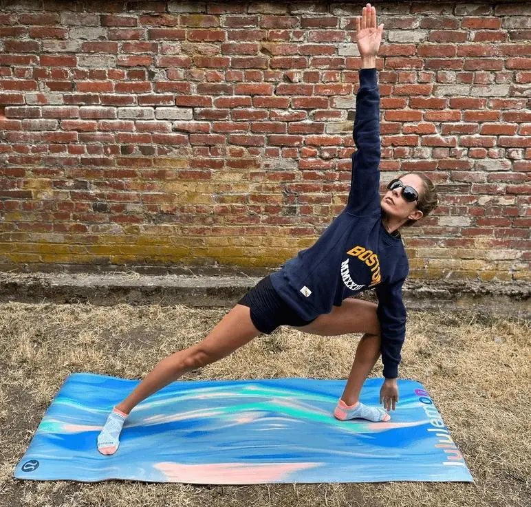 A woman doing yoga in socks