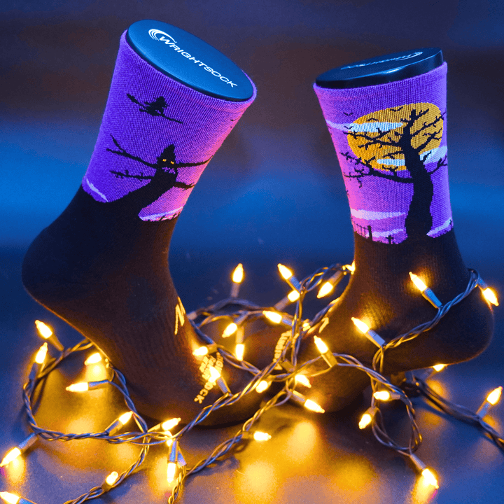 Halloween Night socks surround by lights.