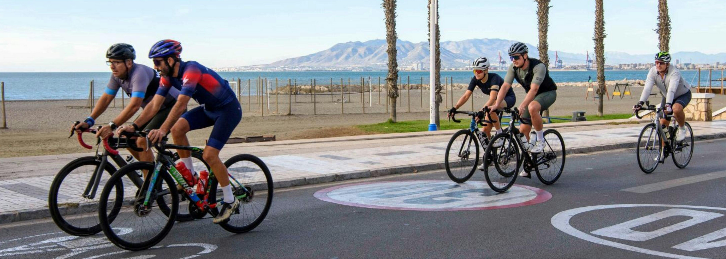 Cyclists biking down coast while wearing the best socks for sensitive feet